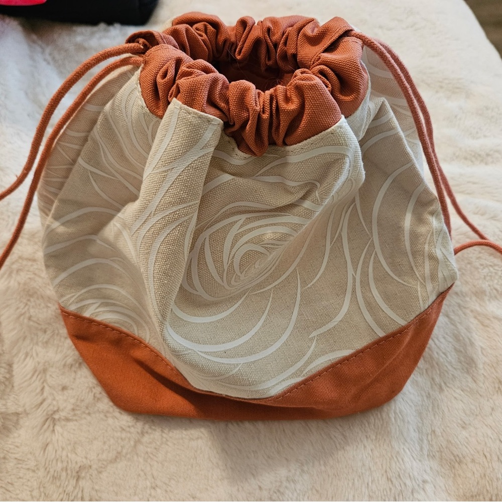 Stylish Orange and Cream Drawstring Bag